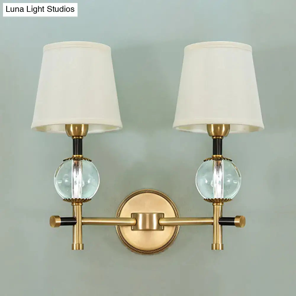 Gold Crystal Fabric Shade 2-Light Sconce with brass finish and orb accents by Decorbites on Tampa Home & Garden Store