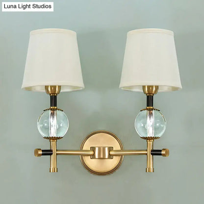 Gold Crystal Fabric Shade 2-Light Sconce with brass finish and orb accents by Decorbites on Tampa Home & Garden Store