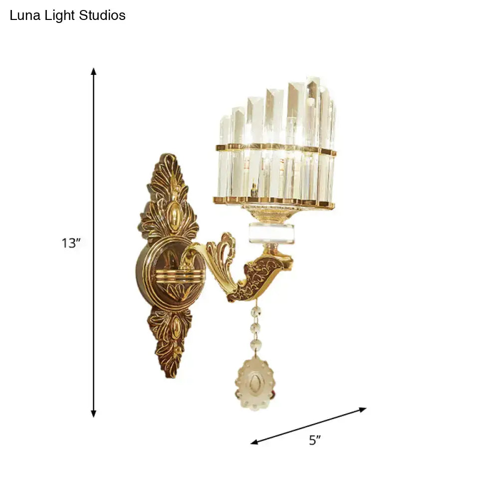 Gold Arc Crystal Sconce with ornate brass backplate and crystal prisms, wall-mounted decor on Tampa Home & Garden Store