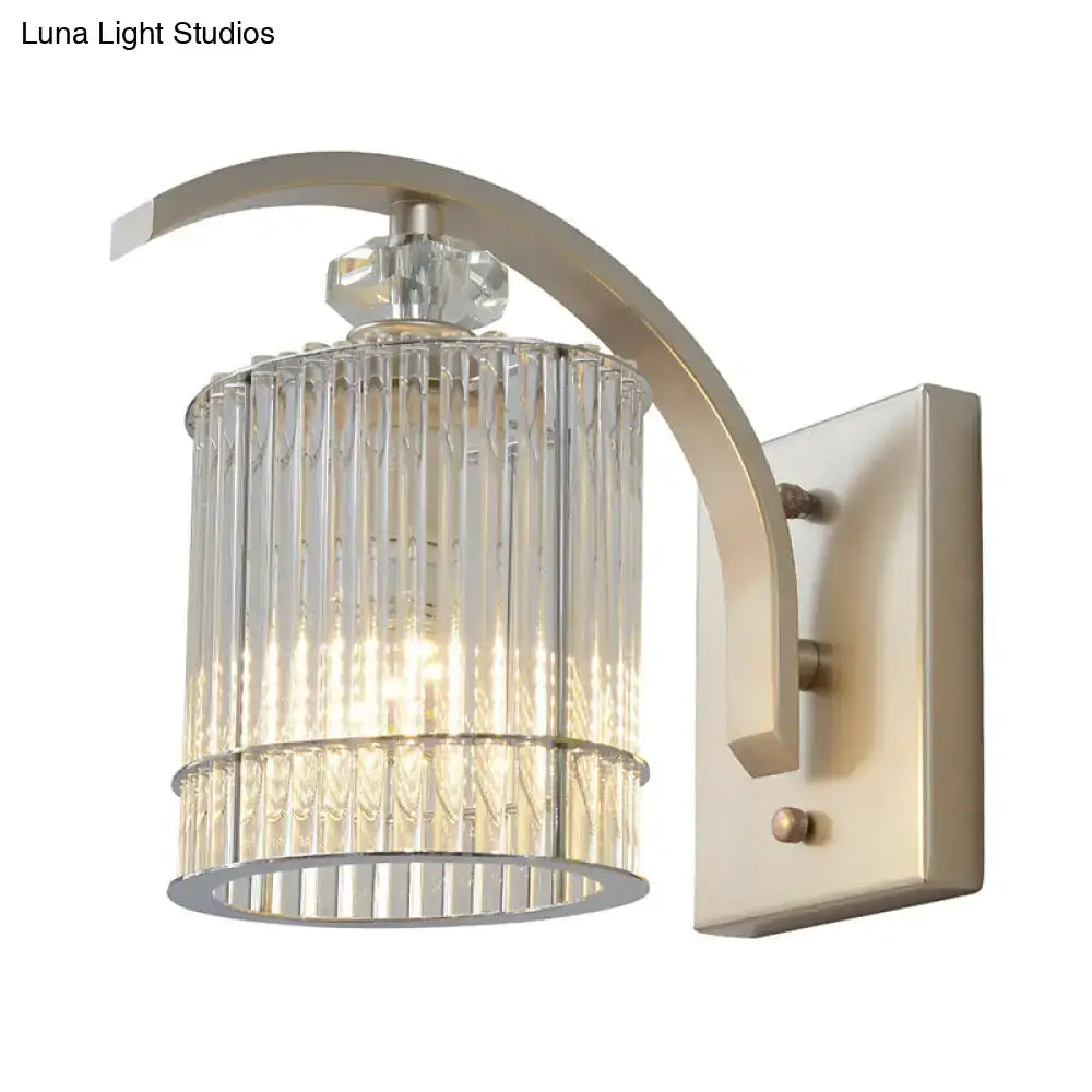 Gold crystal wall sconce Decorbites with glass cylinder shade and curved brass arm on Tampa Home & Garden Store