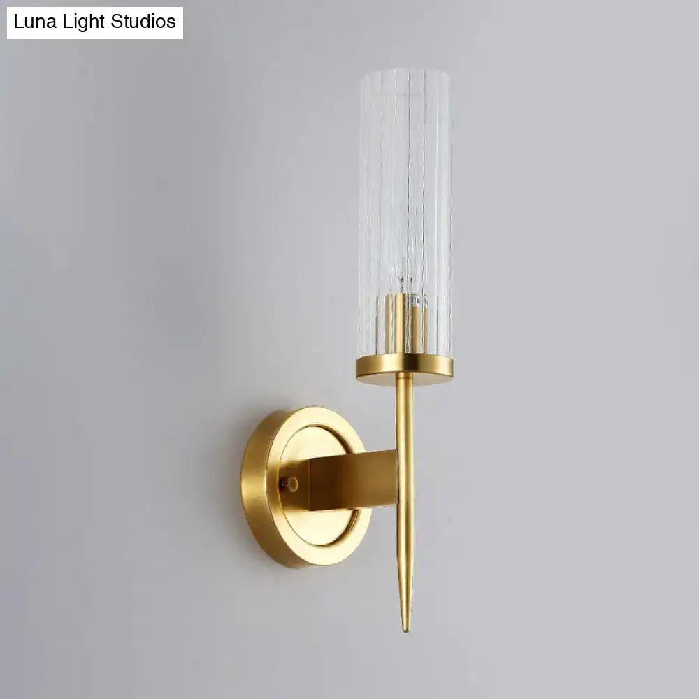 Gold ribbed glass wall sconce by Decorbites with brass backplate on Tampa Home & Garden Store