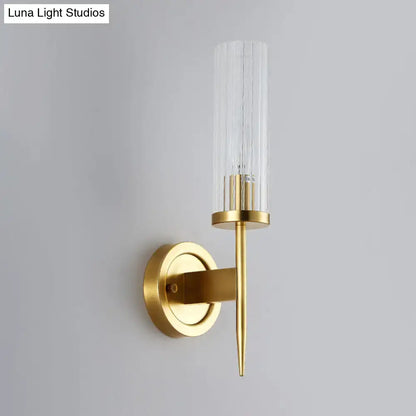 Gold ribbed glass wall sconce by Decorbites with brass backplate on Tampa Home & Garden Store