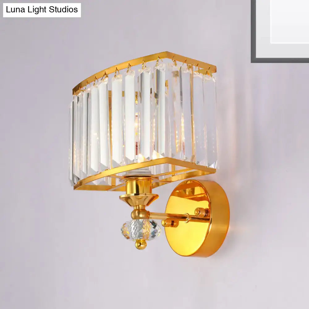 Gold crystal block wall sconce with metal frame and hanging crystal prisms on Tampa Home & Garden Store