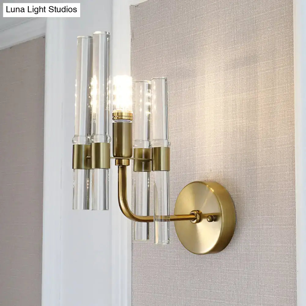 Gold crystal pipe sconce with glass tube prisms and brass arm by Decorbites on Tampa Home & Garden Store