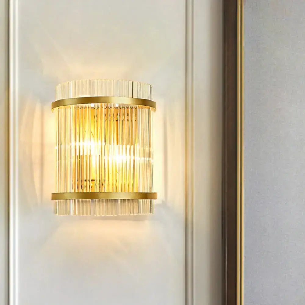 Gold crystal dual-head rod sconce with brass bands and vertical glass rods on Tampa Home & Garden Store