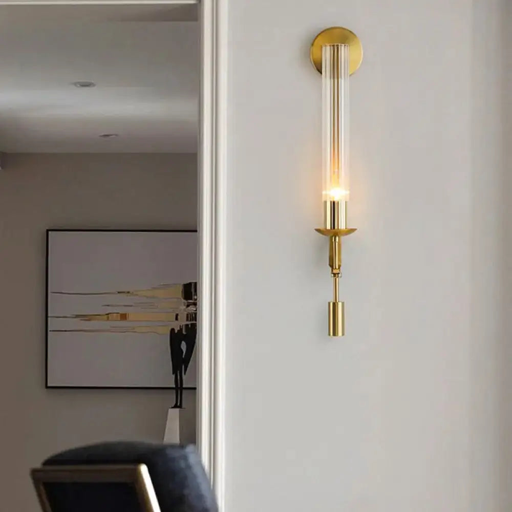 Gold glass bathroom sconce with cylindrical tube and brass backplate by Decorbites wall-mounted on Tampa Home & Garden Store