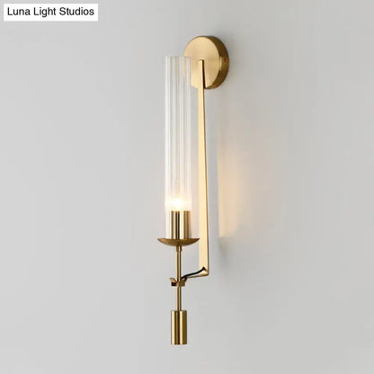 Gold glass bathroom sconce with clear ribbed glass tube and brass finish by Decorbites on Tampa Home & Garden Store