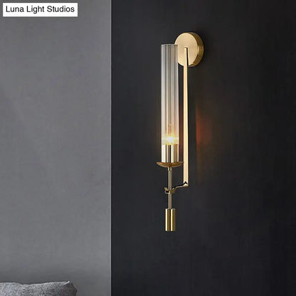 Gold glass bathroom sconce with cylindrical shade and brass backplate by Decorbites on Tampa Home & Garden Store