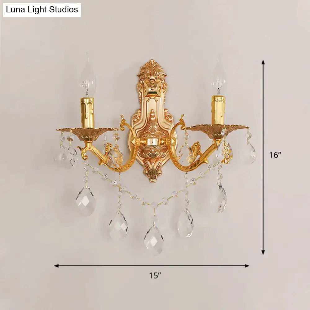 Gold crystal candelabra sconce by Decorbites, two-arm wall lamp with hanging prisms on Tampa Home & Garden Store