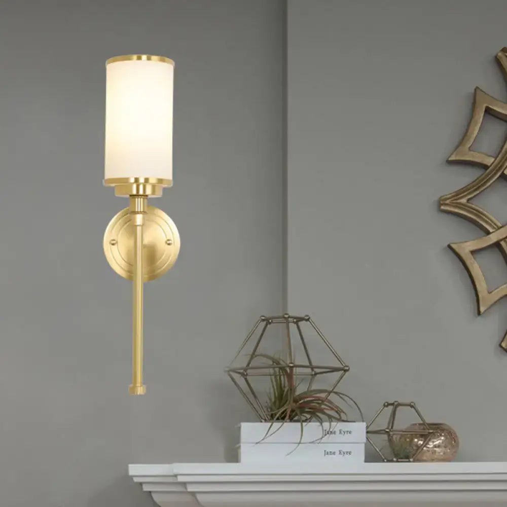Gold glass milky postmodern sconce by Decorbites with cylindrical white shade on brass backplate on Tampa Home & Garden Store