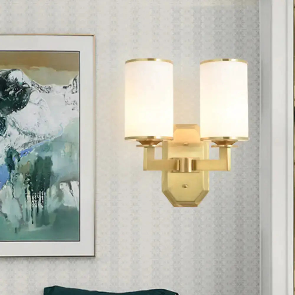 Modern gold wall sconce with two opal glass shades for bedroom lighting Decorbites on Tampa Home & Garden Store