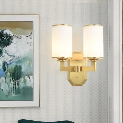 Modern gold wall sconce with two opal glass shades for bedroom lighting Decorbites on Tampa Home & Garden Store