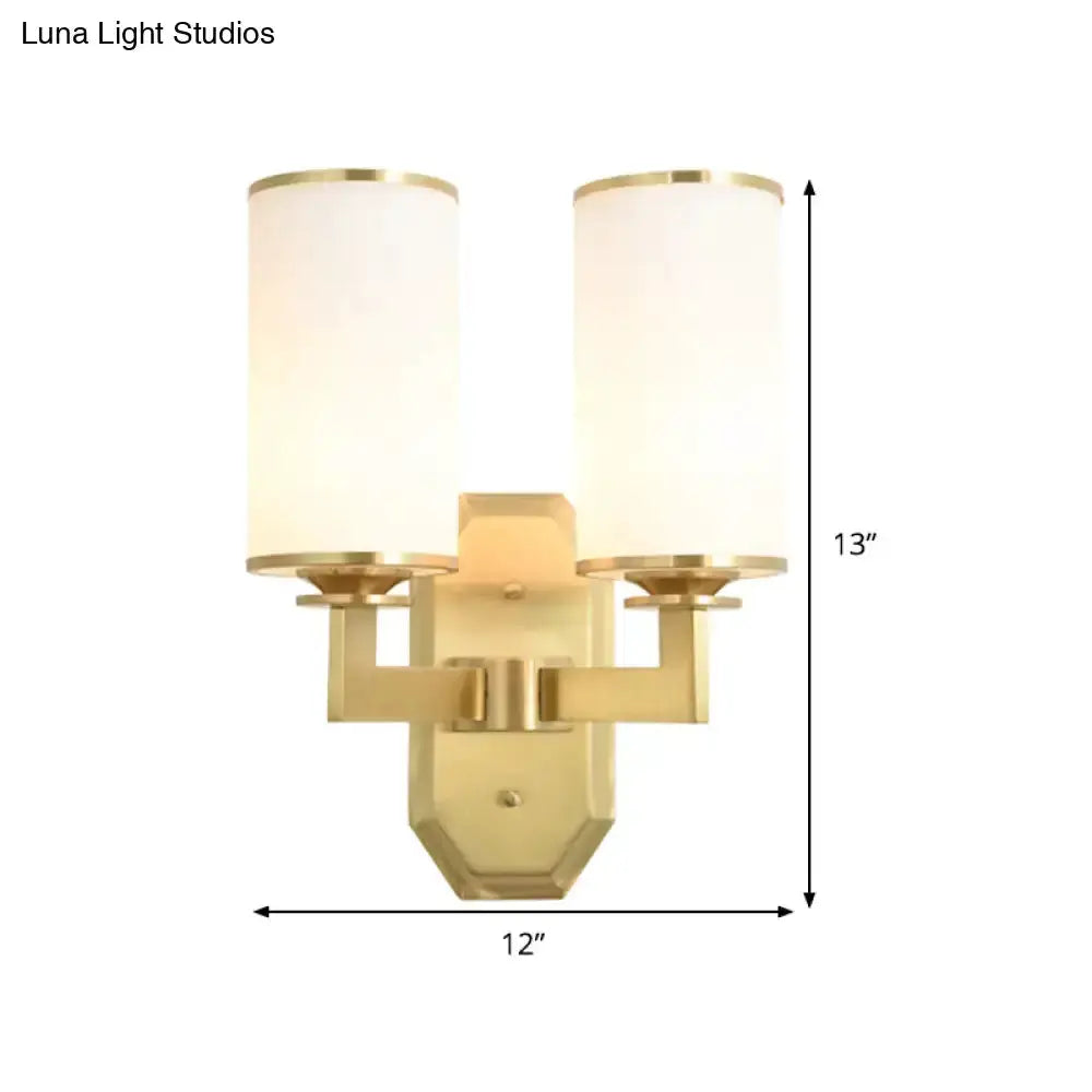 Modern gold wall sconce with dual opal glass shades, bedroom light fixture by Decorbites on Tampa Home & Garden Store