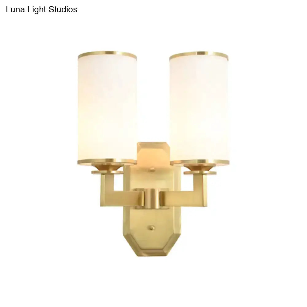 Modern gold wall sconce by Decorbites with opal glass shades, dual-light brass fixture on Tampa Home & Garden Store