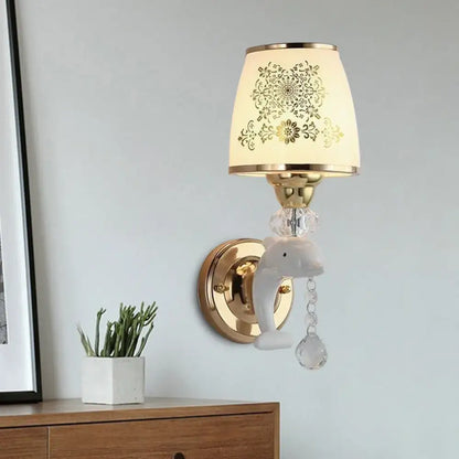 Gold Dolphin Wall Sconce by Decorbites with crystal drops and beige lampshade on Tampa Home & Garden Store