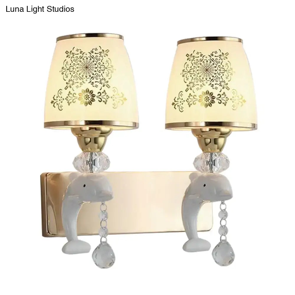 Gold Dolphin Wall Sconce with twin beige shades, crystal drops, pair of dolphin backplates on Tampa Home & Garden Store