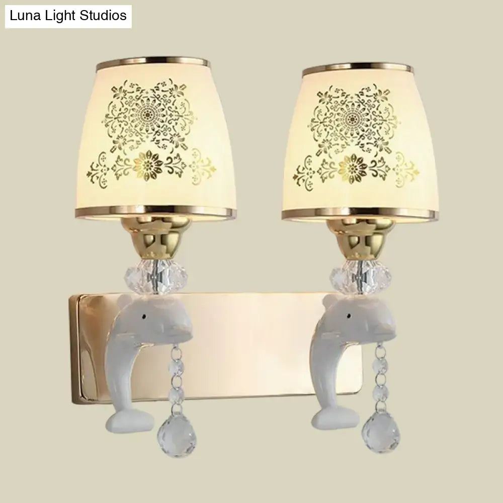 Decorbites Gold Dolphin Wall Sconce with dual lights, cream floral shades, gold finish on Tampa Home & Garden Store