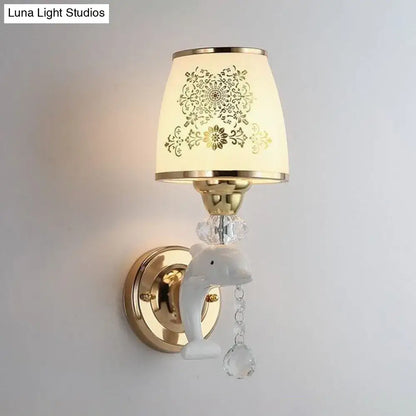 Gold Dolphin Wall Sconce with crystal drops and ornate floral lampshade on Tampa Home & Garden Store