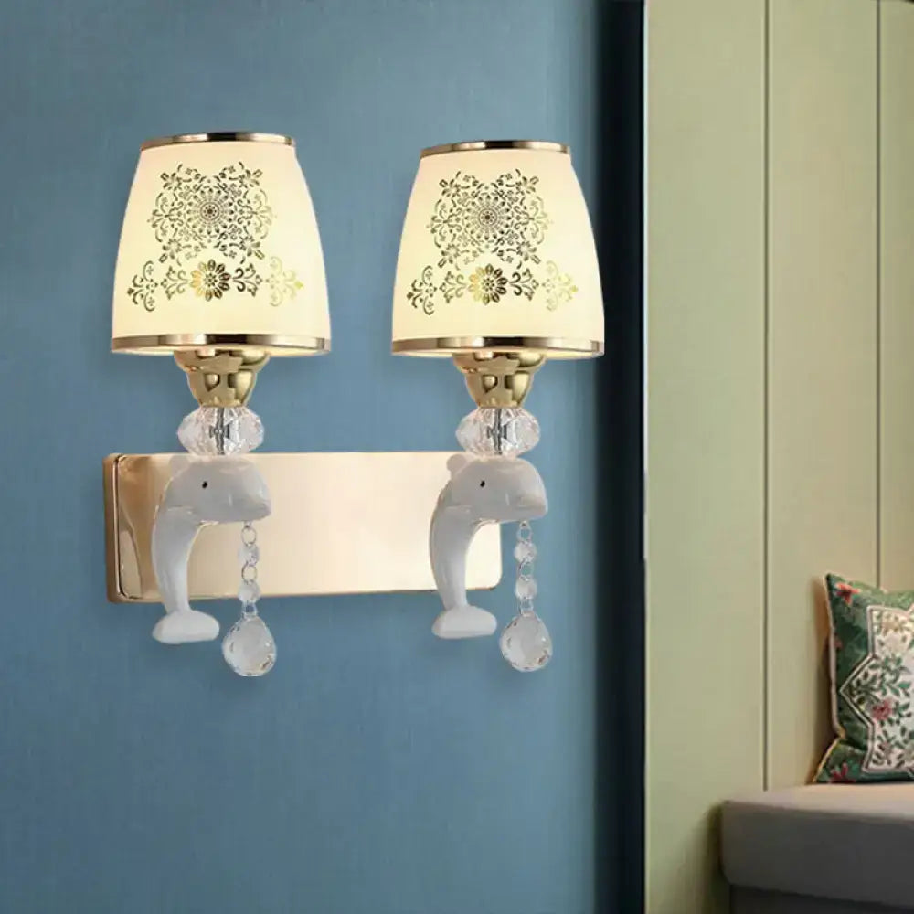 Gold Dolphin Wall Sconce by Decorbites with two brass-backplate lamps and crystal drops on Tampa Home & Garden Store