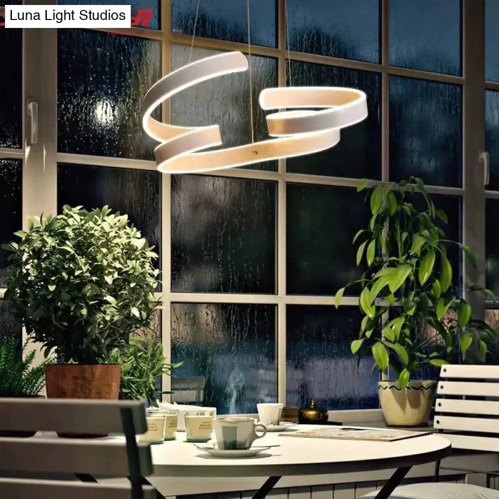 Modern gold and white spiral LED pendant light for dining room by Decorbites on Tampa Home & Garden Store