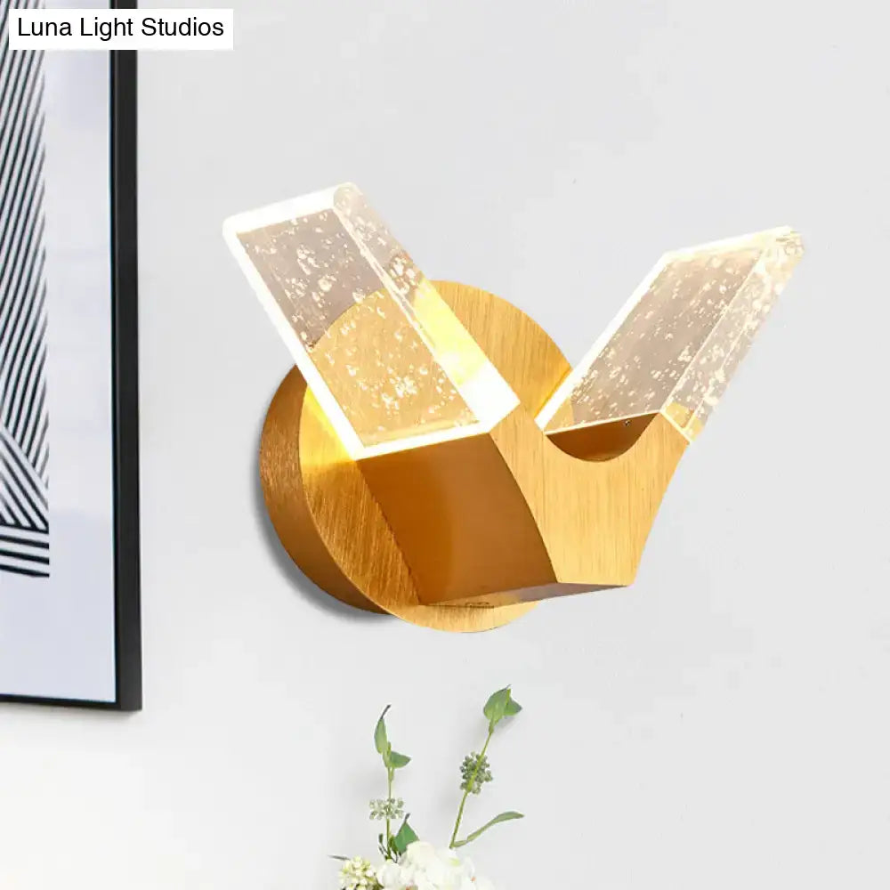 Gold Wings Wall Light wall sconce with gold-brass finish and clear wing panels on a round base on Tampa Home & Garden Store