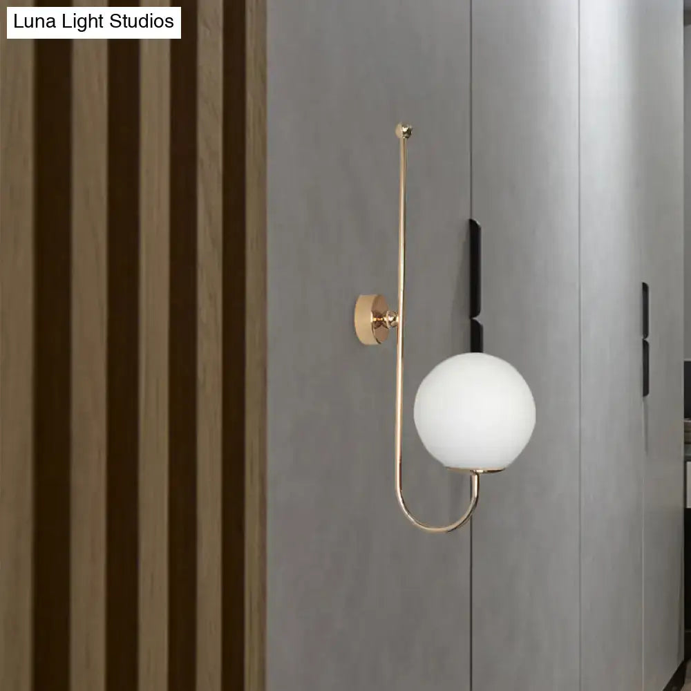 Gold gooseneck wall sconce with white glass globe by Decorbites, modern home lighting on Tampa Home & Garden Store