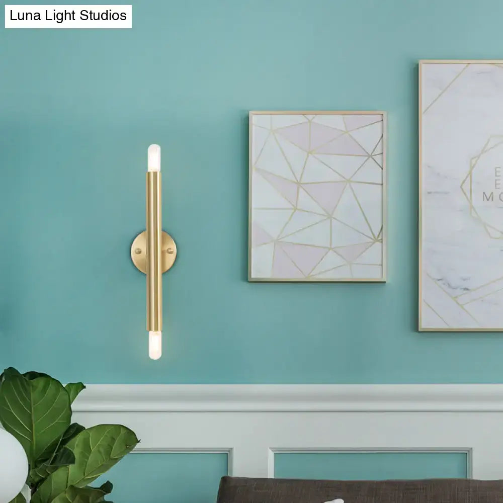 Gold tubular wall sconce by Decorbites, brass finish, wall-mounted lighting on Tampa Home & Garden Store