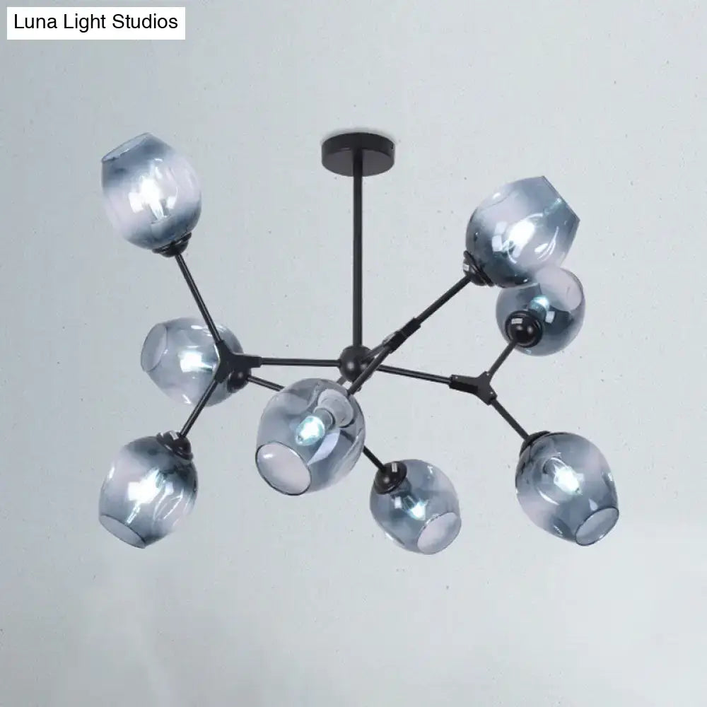 Blue glass semi-flush light with black sputnik-style arms and multiple glass shades on Tampa Home & Garden Store