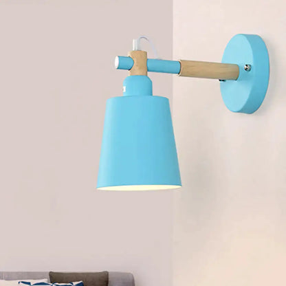 Blue wall sconce with wood arm by Decorbites, round mount modern lamp on Tampa Home & Garden Store