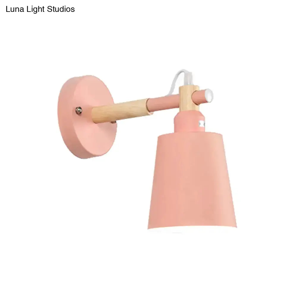 Wall sconce light with pink shade and wooden arm for bedroom decor on Tampa Home & Garden Store