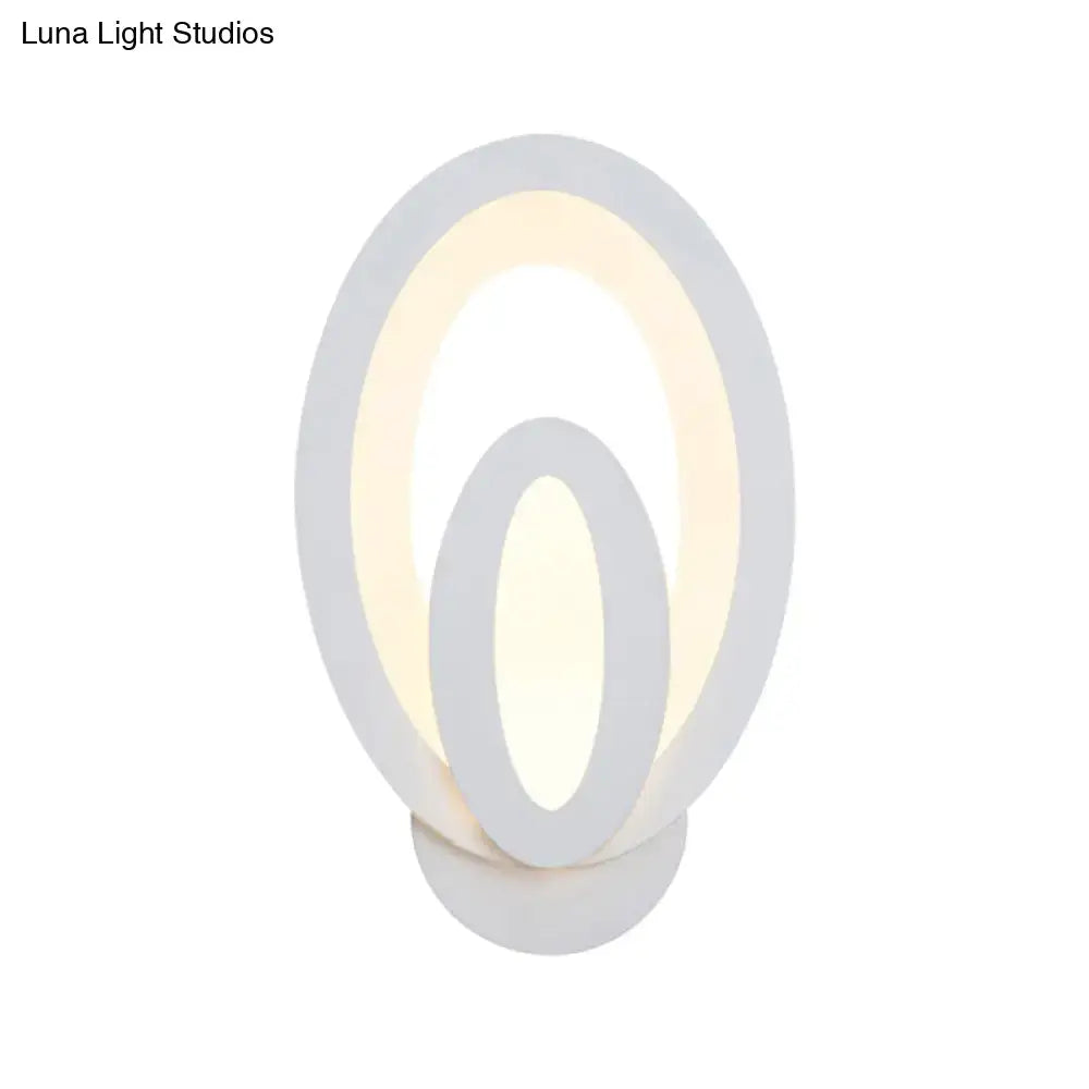 Gray Layered LED Sconce by Decorbites with layered gray oval rings and warm illumination on Tampa Home & Garden Store