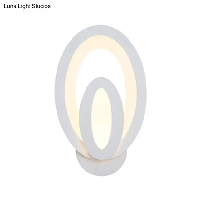 Gray Layered LED Sconce by Decorbites with layered gray oval rings and warm illumination on Tampa Home & Garden Store