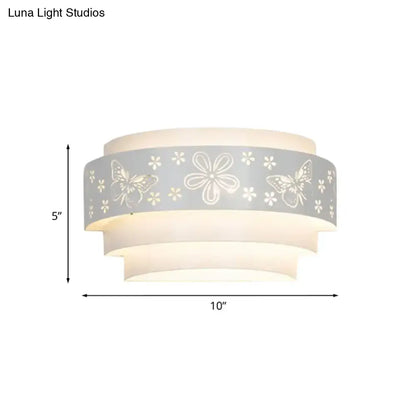 White tiered wall sconce with a gray floral butterfly band and layered white shades 10inW x 5inH on Tampa Home & Garden Store