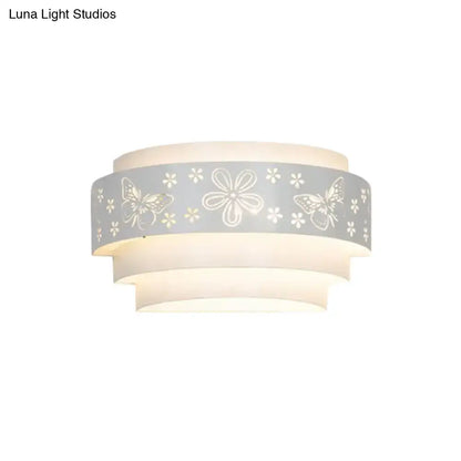 White tiered wall sconce with a gray floral band and butterfly motifs Decorbites on Tampa Home & Garden Store