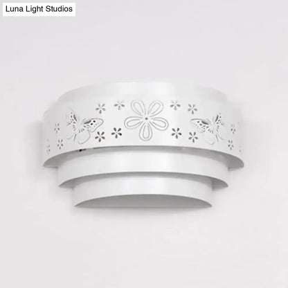 White tiered wall sconce with floral cutout bands by Decorbites on Tampa Home & Garden Store