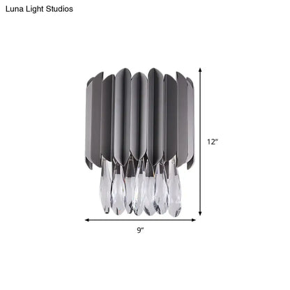 Black K9 crystal teardrop dual-light sconce with black metal petals and crystal drops on Tampa Home & Garden Store
