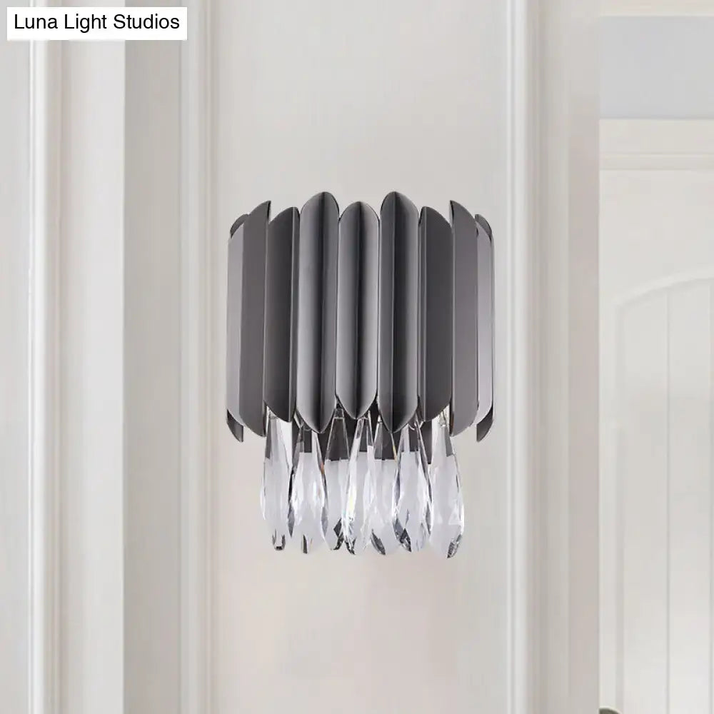 Black K9 crystal teardrop dual-light sconce with stacked black panels and crystal drops on Tampa Home & Garden Store