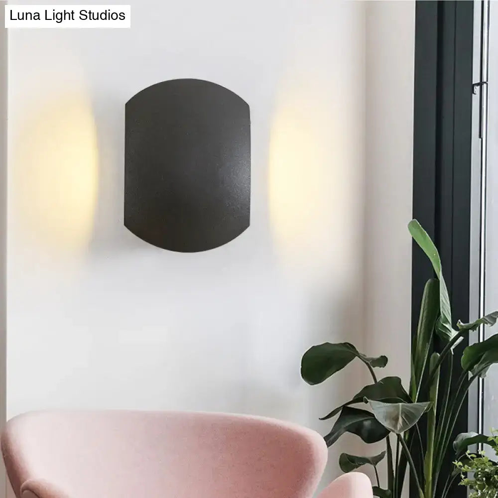 Black oval outdoor wall sconce by Decorbites on Tampa Home & Garden Store