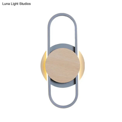 Gray Wood Geometric Sconce by Decorbites with gray metal oval frame and wood circle on Tampa Home & Garden Store