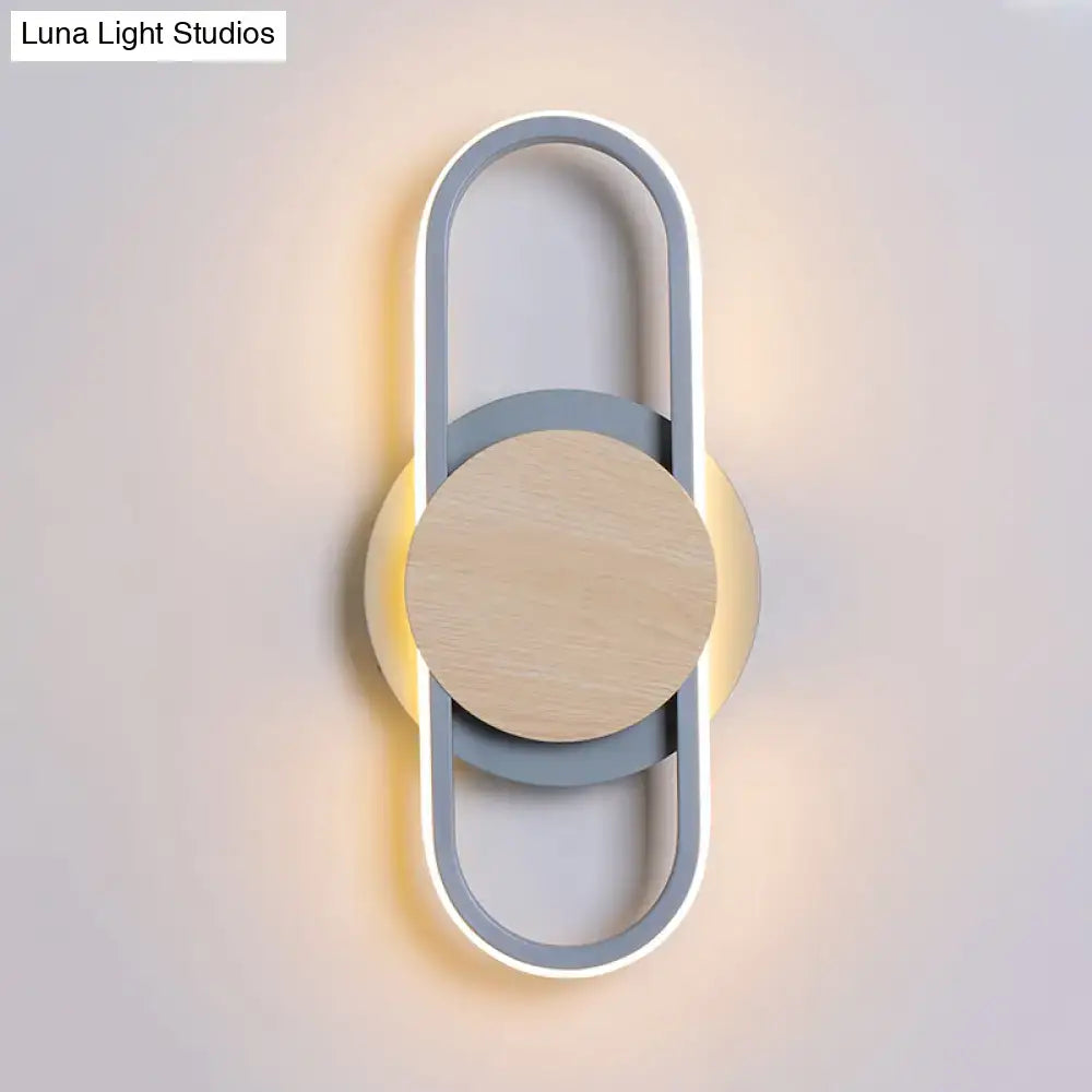 Gray Wood Geometric Sconce with circular wood center and blue-gray loop frame by Decorbites on Tampa Home & Garden Store