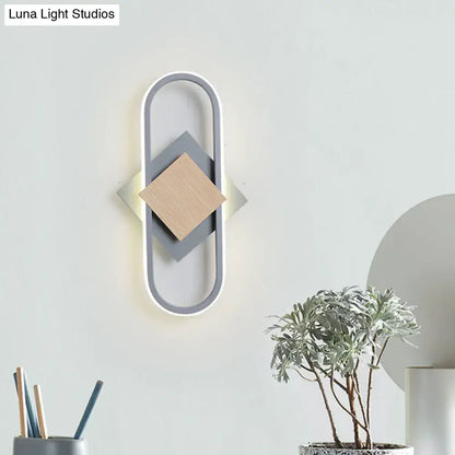 Gray wood geometric sconce with oval LED frame and diamond wood centerpiece by Decorbites on Tampa Home & Garden Store
