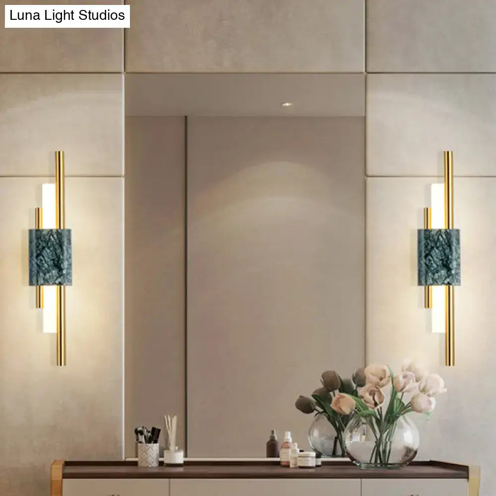 Pair of Green Marble Wall Sconces with gold rods by Decorbites, mounted beside mirror on Tampa Home & Garden Store