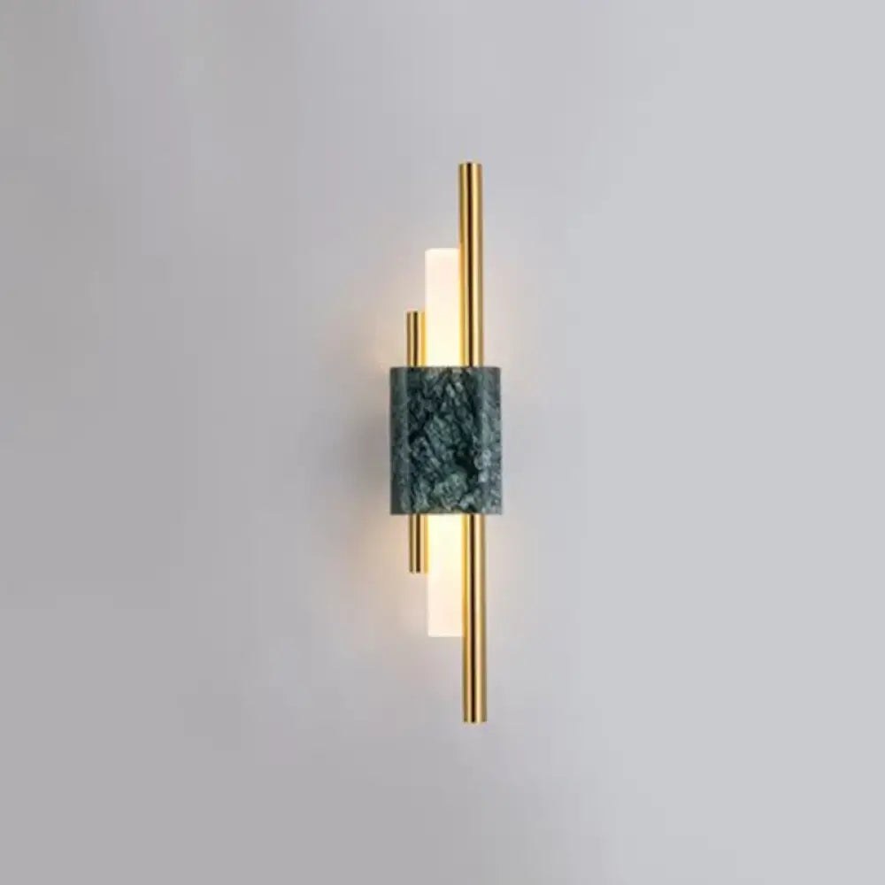 Green marble wall sconce with brass vertical rods and frosted glass light bar on Tampa Home & Garden Store