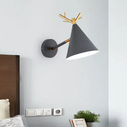 Grey Antler Wall Sconce with gray cone shade and gold accents by Decorbites on Tampa Home & Garden Store