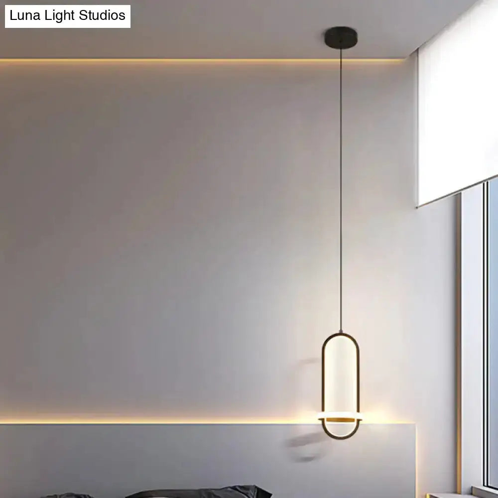 Modern halo pendant light with frosted shade and brass ring, warm glow by Decorbites on Tampa Home & Garden Store