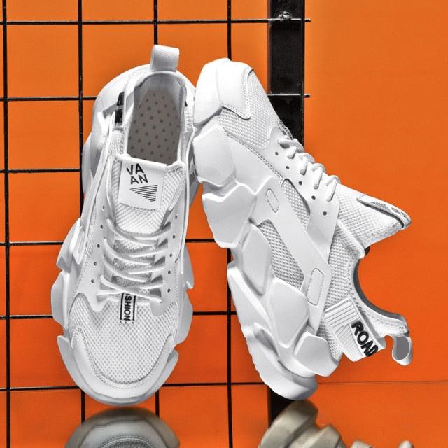 Stevvex white modern high-top sneakers, chunky sole, breathable mesh, pair on display on Tampa Home & Garden Store