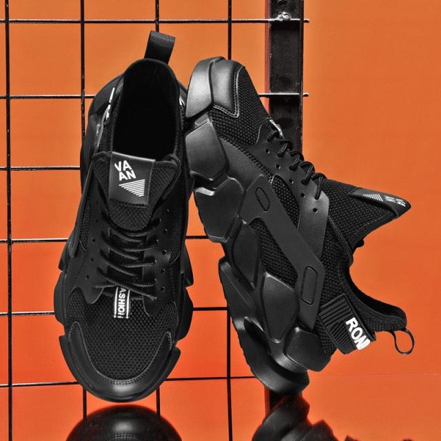 Stevvex ST85SH2255FOP two black high-top chunky sneakers with mesh uppers and rugged sole on Tampa Home & Garden Store