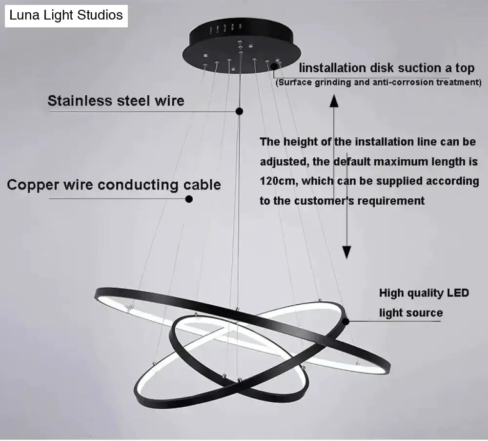 Pendant light modern interlocking ring LED fixture with black rings on Tampa Home & Garden Store