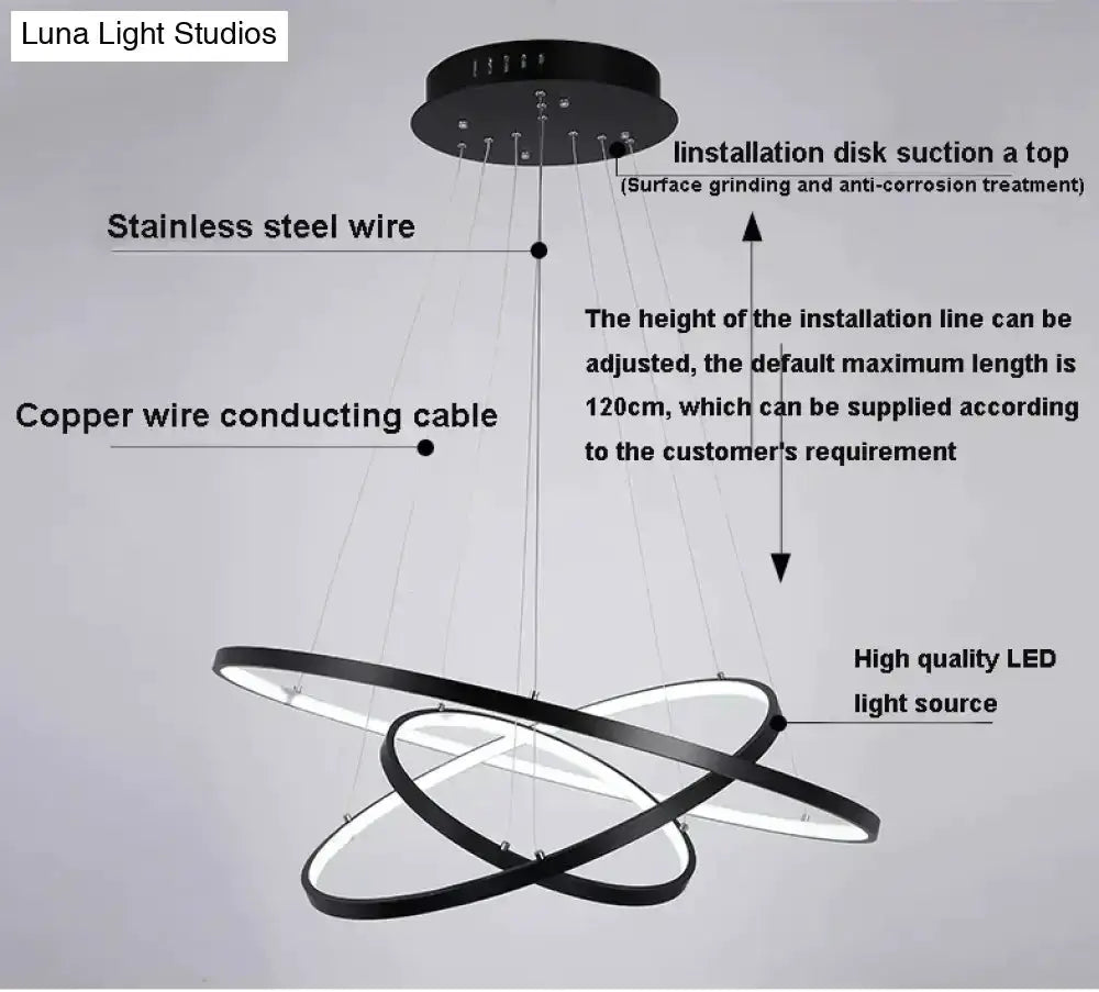 Pendant light with interlocking ring LED design for dining rooms featuring black rings on Tampa Home & Garden Store