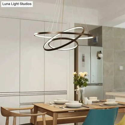 Pendant light with interlocking bronze rings, LED, Decorbites for dining room on Tampa Home & Garden Store
